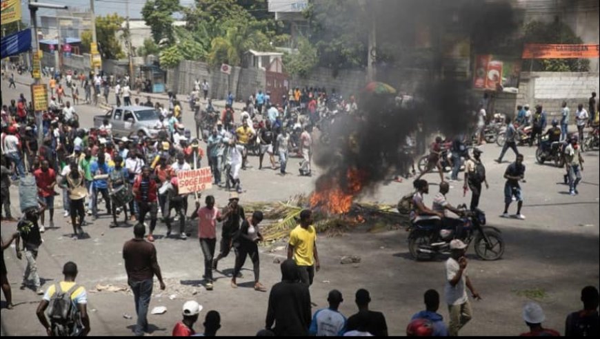 POLICE USE TEAR GAS AS HUNDREDS OF PEOPLE PROTEST THE HAITIAN GOVERNMENT