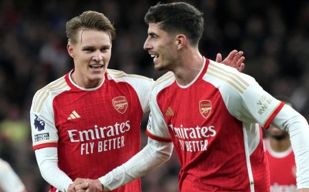 ARSENAL'S VICTORY OVER LUTON PUTS THEM BACK ATOP THE TABLE.